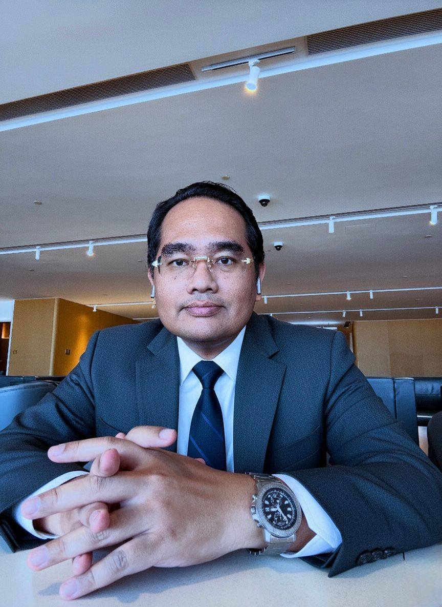 Yossy Andrew Girsang